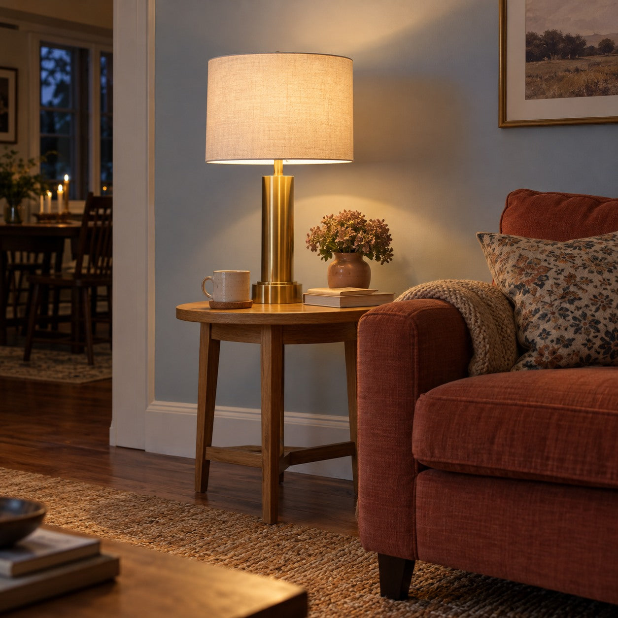 Brass table lamp beside a comfortable fabric sofa